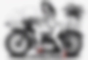 Pinup doll riding motorbike along the beach tattoo idea