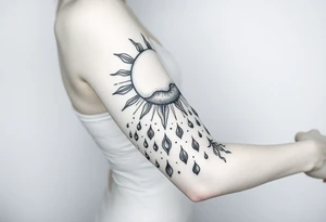 A large sun melting a snow flake and the snow flakes turning into rain drops as it rains down tattoo idea