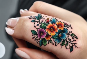 Small Floral vine going up my finger onto my hand tattoo idea