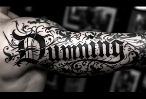 Dunning, left forearm details include angel wing, greek type of font,jungle leaves , tiger claw scratch tattoo idea