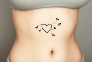 Leann going down ribs with heart and paper planes tattoo idea