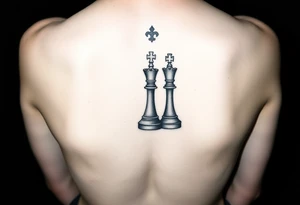 Queen and king chess piece on woman's forearm tattoo idea