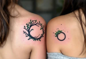Two matching couples man and women tattoos black tree rings with a splash of green leaves tattoo idea