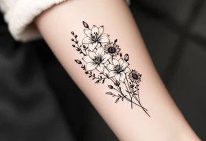 Dainty Stargazer lillies with small sunflowers and tulip buds in a dainty wildflower bouquet with stems tattoo idea