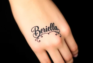 "Briella" in gangster style on hand along thumb tattoo idea
