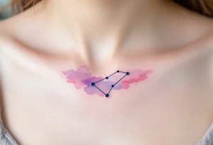 A soft pastel rendering of the Capricorn constellation on the collarbone, with pink and lavender clouds behind it. tattoo idea