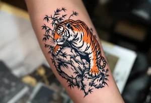 A black ink tiger with orange and white fur climbing down a cliffside with bamboo leaves. tattoo idea
