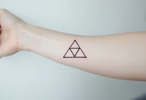 A minimalist black ink triquetra, tattoo idea