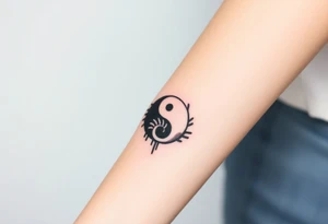 A set of black and white fingerprints forming a yin-yang symbol tattoo idea