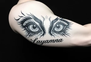 eyes with the name layanna at the bottom of it tattoo idea