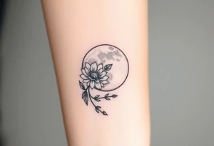 Small black and white tattoo full moon with small chrysanthemum and tiny scorpio gliph inside moon tattoo idea