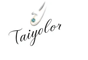 The name Taiylor spelled vertical with the O as a diamond ring behind the ear tattoo tattoo idea