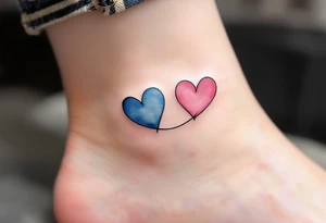 Two watercolor-style hearts—one blue, one pink—connected by a delicate black line across the ankles. tattoo idea