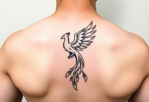 magnificent phoenix rising from golden flames with trailing embers tattoo idea