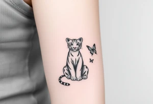 Tiger cub sitting down with paw up and on the paw is sitting a butterfly and there’s two butterflies on each side tattoo idea