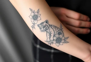 Floral tattoo with baby tiger in the flowers 🌺 tattoo idea
