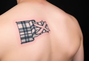 Scotland the brave tartan on left shoulder with skin peeling back to reveal tartan underneath tattoo idea