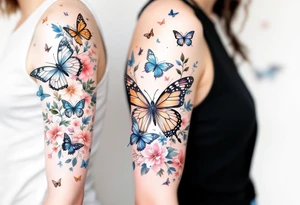 Different butterflies in many sizes with flowers tattoo idea