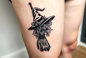 Which is broom with handle
 a witches hat with fall maple leaves tattoo idea