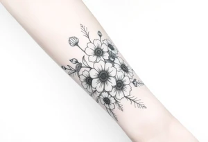 Large floral design with multiple types of flowers tattoo idea