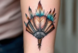 A tribal feather fan in brown, white, and turquoise, held together by leather bindings. tattoo idea