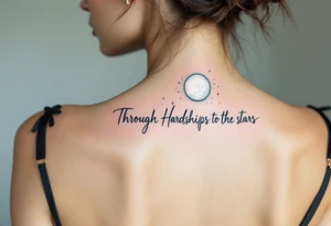 Flowing in teal ink across the spine, “Through Hardships to the stars” is crowned with a glowing white moon. tattoo idea