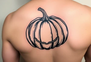 Spooky carved pumpkin tattoo idea