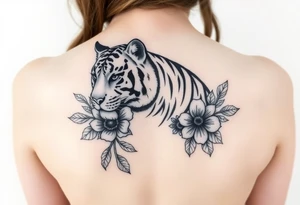 a whole tiger with some flowers around it tattoo idea