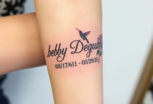 Tattoo of the exact name Debby Deguzman in chunky bold curly cursive with the exact dates of 08/17/61-05/29/25 surrounded by 1 hummingbird and 1 rose tattoo idea