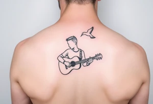 Person playing guitar with top half of head off and a bird flying out of head tattoo idea