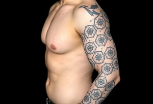 Good karma symbols inside honey combs repeated tattoo idea