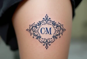 Victorian Lace Monogram – Ivory and dusty blue “C / M” styled in ornate vintage typography with lace-like borders. tattoo idea
