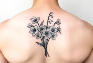 small bit of color, bouquet of daffodils, daisies, lily of the valley tattoo idea