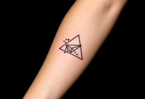 Small geometric triangle with a geometric paper plane going around the world with thin fine lines tattoo idea