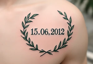 15.06.2012 in typewriter font encased in a dusty green laurel wreath. tattoo idea