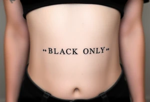 text reading "BLACK ONLY" across a womb tattoo tattoo idea