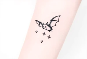 Small bat flying in front of stars tattoo idea