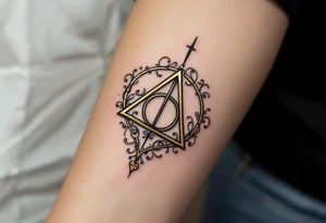 A detailed Deathly Hallows symbol (triangle, circle, and line) surrounded by swirling gold and silver tattoo idea