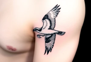 Osprey in flight with fish grasped between its talons tattoo idea