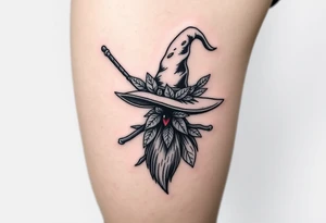 Which is broom with handle
 a witches hat with leaves tattoo idea