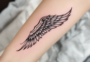 beautiful strong angel wing with word "Warrior" tattoo idea