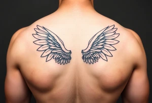 Small minimalist upright angel wings tattoo idea