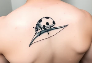 Ladybug reed sitting on a leaf tattoo idea