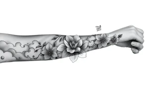 Forearm sleeve tattoo including lion clouds jasmine flower names dates covering the whole forearm. I don’t want it to be girly more tough tattoo idea