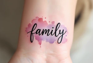 A watercolor splash in dusty rose and lavender behind the word family in sleek black ink. tattoo idea