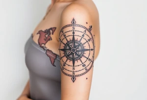 antique compass rose overlaid on weathered world map with zodiac symbols tattoo idea
