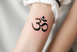 The Om Symbol (ॐ) – A sacred sound and spiritual icon, often tattooed in black or deep gold, representing the essence of the universe. tattoo idea