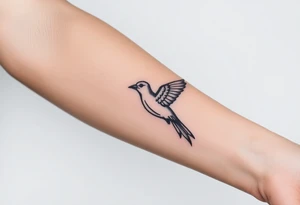 Feminine bird tattoo idea