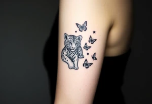 Tiger cub playing with butterflies tattoo idea