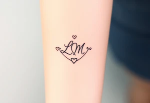 wedding ring with initials L and M and hearts tattoo idea